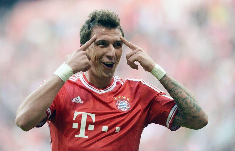 Bayern Munich 3-2 Hertha Berlin. Mario Mandzukic scored twice as Bayern remained undefeated through 10 Bundesliga matches, good to put the side atop the table. Cristof Stache / AFP