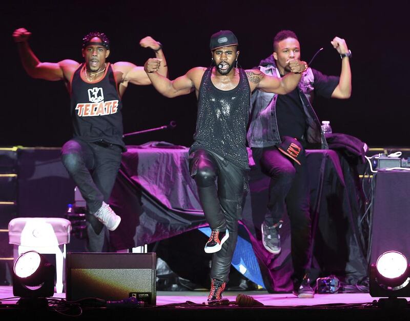 Jason Derulo, centre, performed before Alicia Keys at Friday's gig. Sarah Dea / The National



