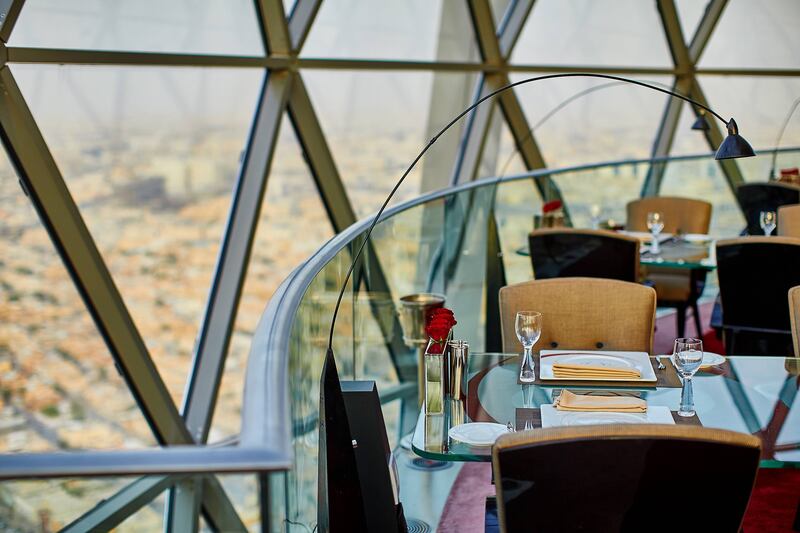 A table at The Globe restaurant in Al Faisaliah Tower overlooks the city below