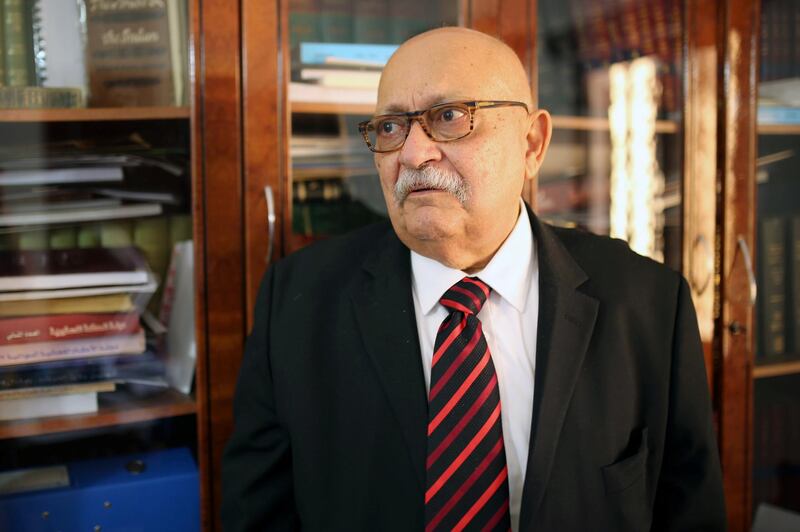 Human rights lawyer, Nabil Adib poses at his office during an interview with AFP journalist on December 22, 2015 in the Sudanese capital Khartoum. The human rights situation in Sudan is deteriorating despite efforts by President Omar al-Bashir to hold talks with his opponents to tackle the country's multiple crises, Nabil Adib told AFP. AFP PHOTO / TOM LITTLE (Photo by Tom LITTLE / AFP)