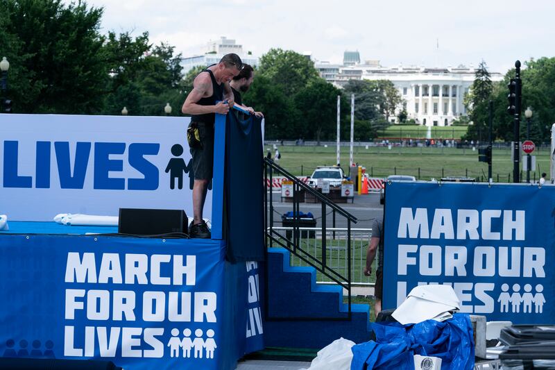 The White House is in view as people prepare for the March for Our Lives rally. AP 