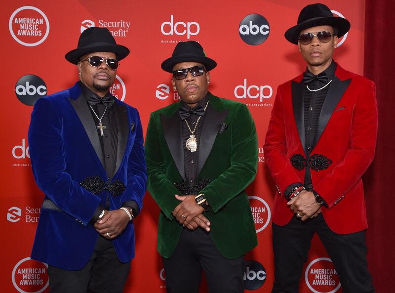 Ricky Bell, Michael Bivins and Ronnie Devoe arrive at the American Music Awards at the Microsoft Theatre on November 22, 2020 in Los Angeles. AFP