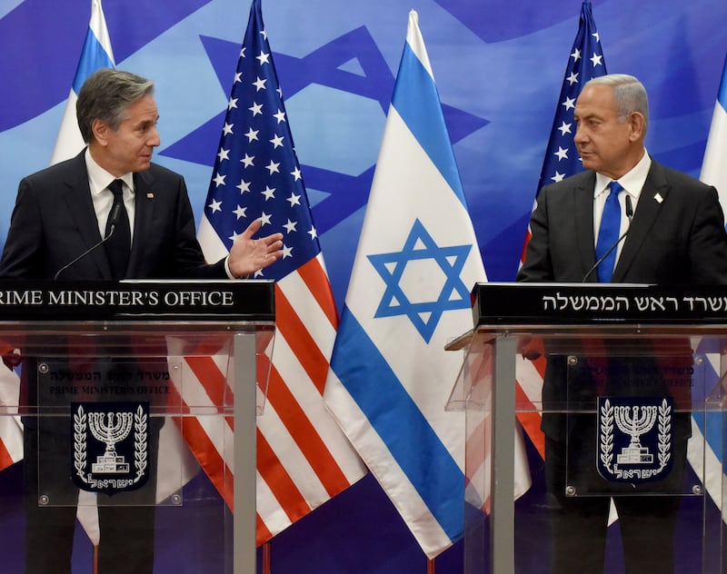 Mr Blinken, left, with Israeli Prime Minister Benjamin Netanyahu at a press conference. EPA