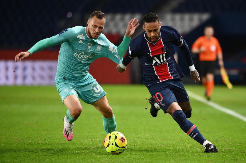 Neymar takes on Angers midfielder Antonin Bobichon. AFP