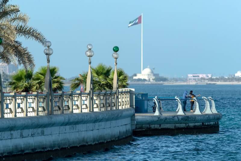 Abu Dhabi residents on the Corniche. Victor Besa/The National