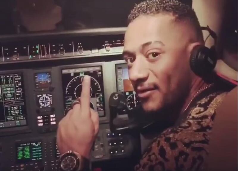 YouTube star Mohamed Ramadan has been criticised for a 'dangerous' video of him flying a plane. Twitter / Mohamed Ramadan 