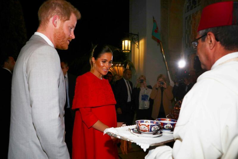 Britain's Prince Harry and Meghan, Duchess of Sussex, arrive to meet Crown Prince Moulay Hassan at a royal residence in Rabat, Morocco. AP