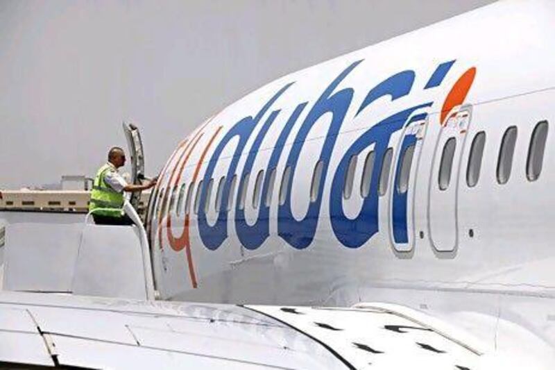 Flydubai expects its first profit this year as the airline's route map expands. Jeff Topping / The National