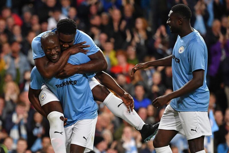 Manchester City Legend's Benjani celebrates scoring his team's second goal. Reuters