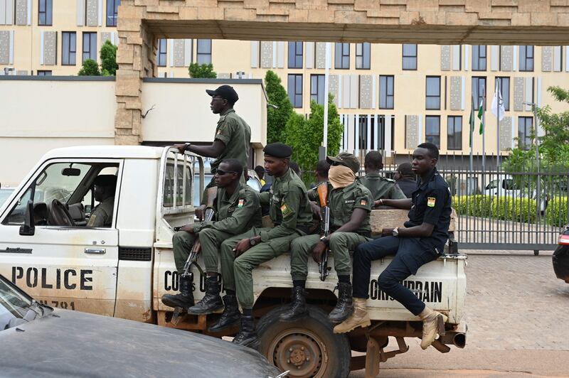 Police patrol the streets of Niger's capital, Niamey, while the country's African Union membership has been suspended. AFP