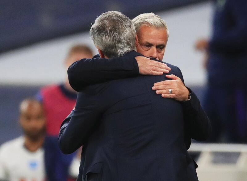 Tottenham manager Jose Mourinho hugs Everton manager Carlo Ancelotti after the match. EPA