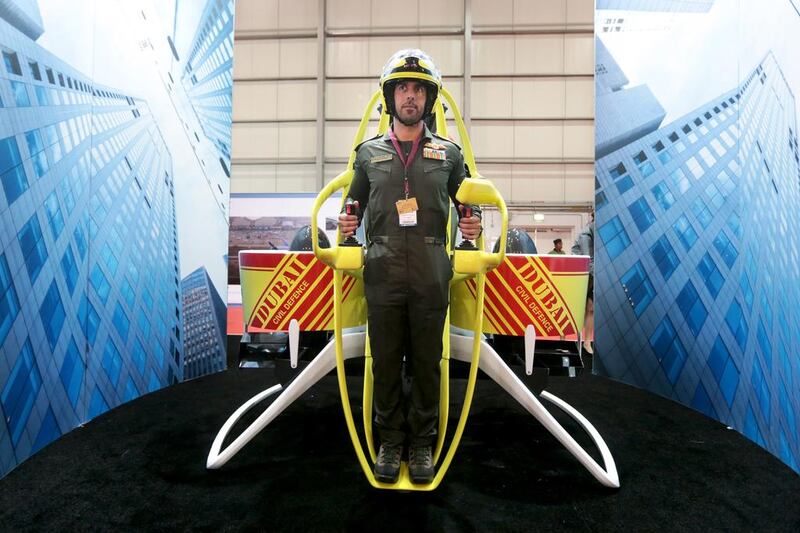 Lieutenant Colonel Osman Mohamed Ahli of the Dubai Civil Defence tries out a Martin Jetpack at the Dubai Airshow. Christopher Pike / The National