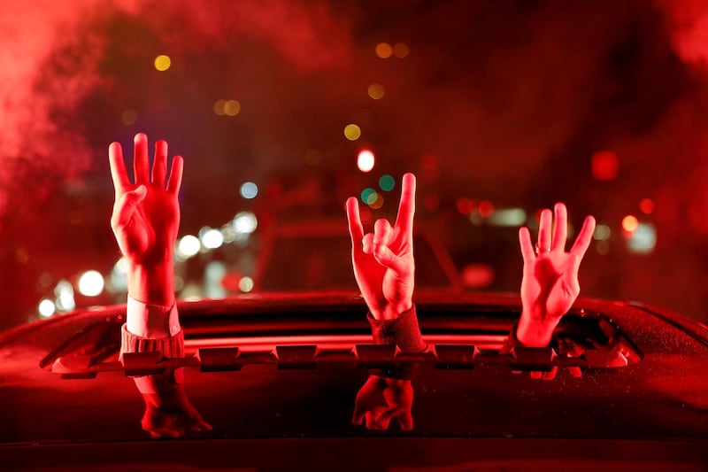 Supporters of AKP gesture in Istanbul. Reuters