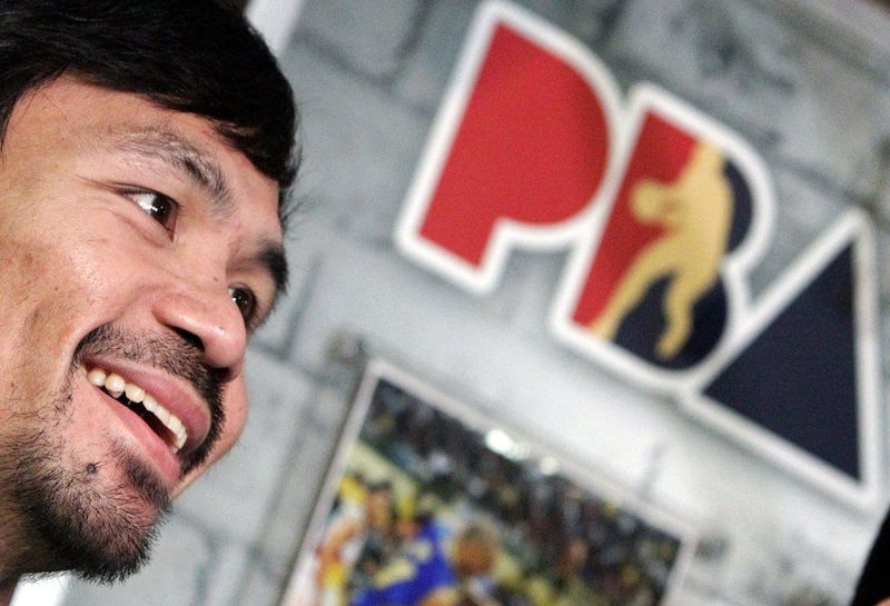 Manny Pacquiao shown during an interview on Friday ahead of the Philippine Basketball Association draft on Sunday, in which he was selected. Ritchie B Tongo / EPA / August 22, 2014