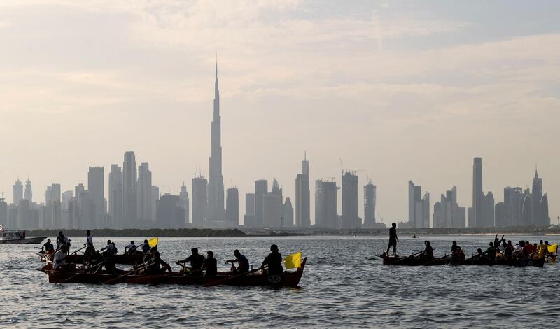 Competitors in the Dubai traditional Rowing Race in al-Jaddaf, on Friday, November 27. AFP