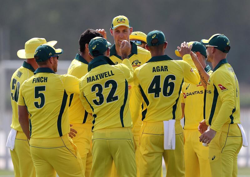 Abu Dhabi, United Arab Emirates - October 22, 2018: Ashfaq Ahmed of the UAE has his wicket taken by Nathan Coulter-Nile of Australia in the match between the UAE and Australia in a T20 international. Monday, October 22nd, 2018 at Zayed cricket stadium oval, Abu Dhabi. Chris Whiteoak / The National