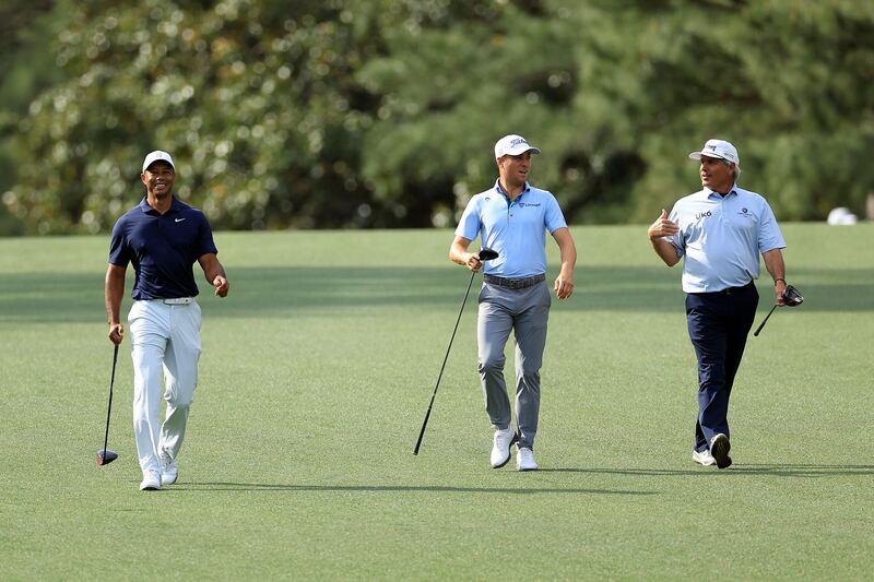 Tiger Woods, Justin Thomas and Fred Couples during a practice round prior to The Masters. AFP