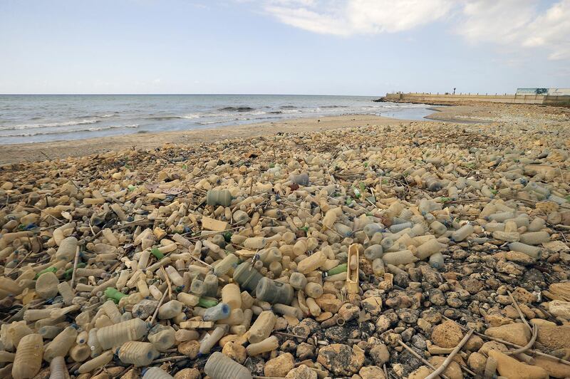Piles of plastic waste are pictured on the seaside in the coastal town of Khalde, south of the Lebanese capital Beirut, on September 22, 2016. (Photo by JOSEPH EID / AFP)