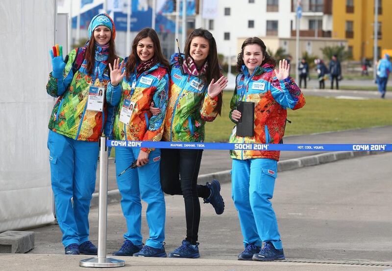 Volunteers are seen  in the athletes village prior to the Sochi 2014 Winter Olympics, at the Coastal Olympic Village on Sunday. Robert Cianflone / Getty Images