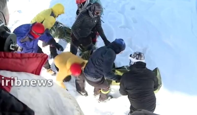 A screen grab from footage broadcast on Iranian state TV Irib shows a rescue operation after eight climbers were found dead and at least seven others missing due to avalanches north of Tehran. AFP