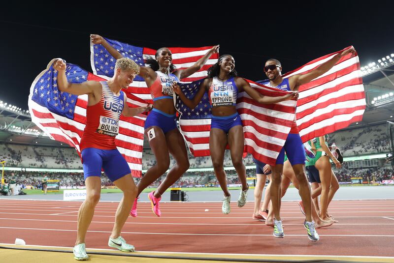 US runners jump for joy after winning gold in the 4x400m mixed relay at the World Athletics Championships in Budapest, Hungary. Getty Images