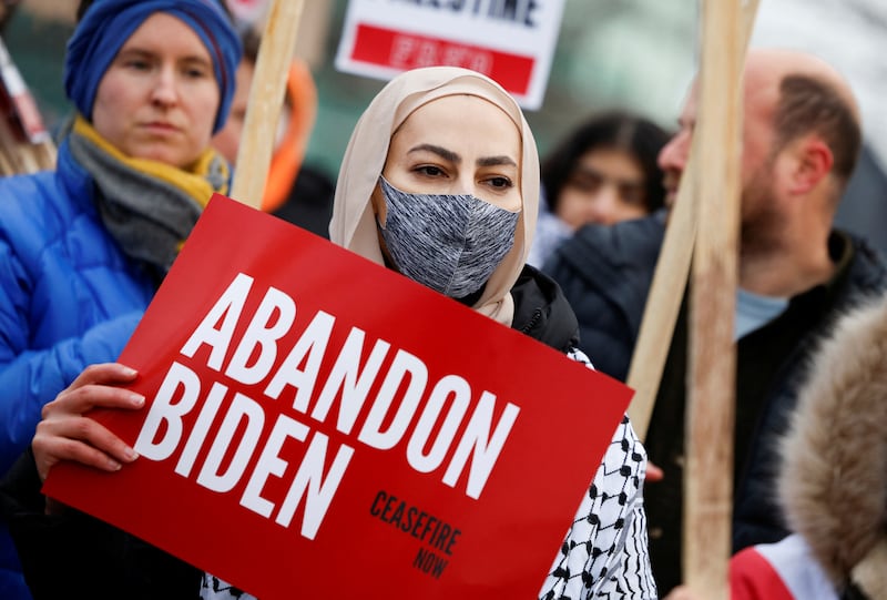 Protestors rally for a Cease Fire in Gaza outside a UAW union hall during a visit by U. S.  President Joe Biden in Warren Michigan. Reuters