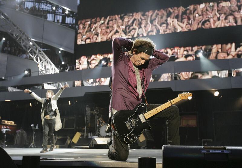 MILAN, ITALY - JULY 11:  The Rolling Stones members Keith Richards (R) and Mick Jagger perform on stage at San Siro Stadium on July 11, 2006 in Milan, Italy.  The concert marks the start of the rock and roll band's European leg of their 'A Bigger Bang' World Tour.  (Photo by Getty Images)