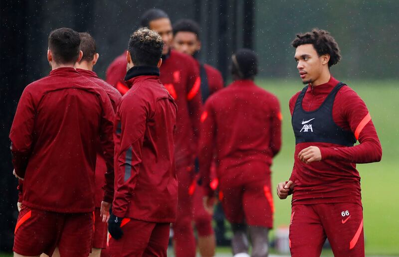 Liverpool defender Trent Alexander-Arnold, right, at training. Reuters
