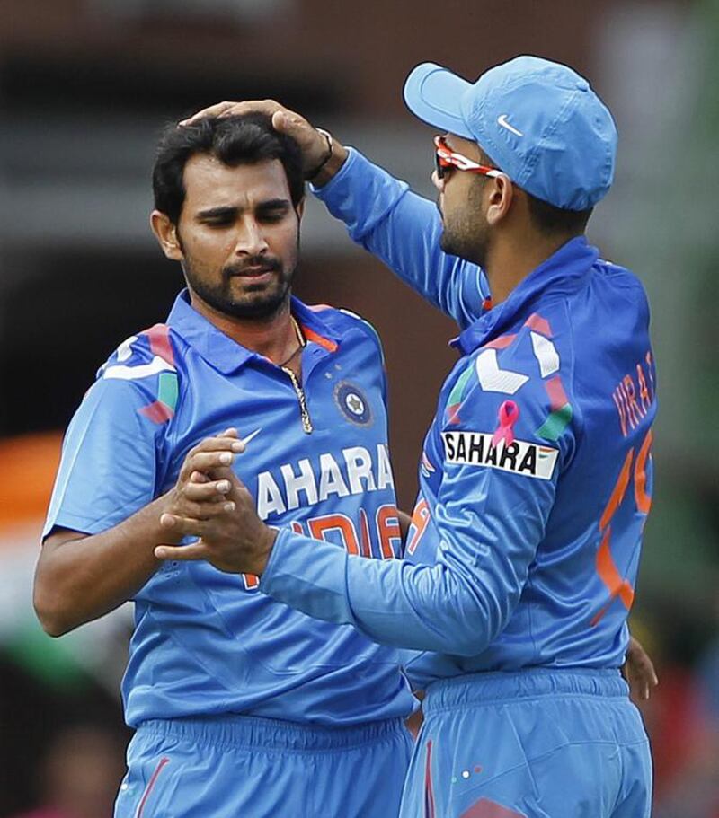 Mohammed Shami, left, and Virat Kohli have been among the few bright spots for India during their tour of South Africa. Siphiwe Sibeko / Reuters