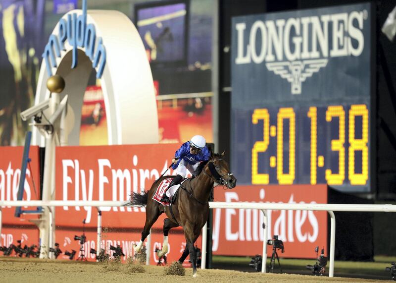 Dubai, United Arab Emirates - March 31st, 2018: Thunder Snow ridden by Christophe Soumillion (blue) wins the Dubai World Cup at the Dubai World Cup raceday 2018. Saturday, March 31st, 2018 at Meydan Race Course, Dubai. Chris Whiteoak / The National