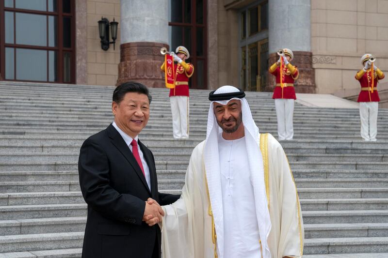 BEIJING, CHINA - July 22, 2019: HH Sheikh Mohamed bin Zayed Al Nahyan, Crown Prince of Abu Dhabi and Deputy Supreme Commander of the UAE Armed Forces (R) greets HE Xi Jinping, President of China (L), during a reception at the Great Hall of the People.

( Mohamed Al Hammadi / Ministry of Presidential Affairs )
---