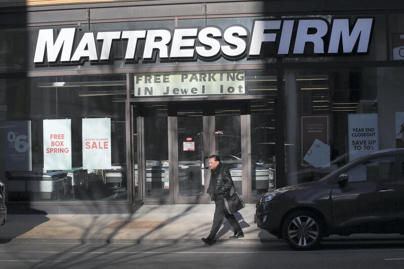 CHICAGO, IL - DECEMBER 06:  A pedestrian walks past a Mattress Firm store on December 6, 2017 in Chicago, Illinois. Steinhoff International Holdings N.V., which is the parent company of Mattress Firm, saw its stock value plummet more than 60 percent today after the resignation of CEO Markus Jooste and an announcement from the company that it was launching an investigation into accounting irregularities.  (Photo by Scott Olson/Getty Images)