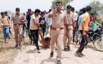 Image taken from the Uttar Pradesh Twitter account (@UPPolice) - the picture gained attention on social media and led to the Uttar Pradesh Police tweeting out an apology. 