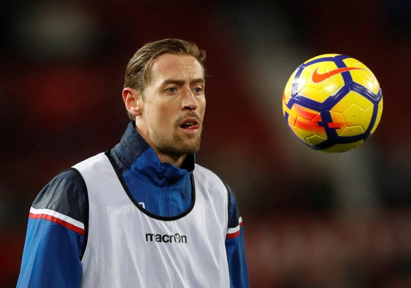 Soccer Football - Premier League - Manchester United vs Stoke City - Old Trafford, Manchester, Britain - January 15, 2018   Stoke City's Peter Crouch warms up before the match   Action Images via Reuters/Carl Recine    EDITORIAL USE ONLY. No use with unauthorized audio, video, data, fixture lists, club/league logos or "live" services. Online in-match use limited to 75 images, no video emulation. No use in betting, games or single club/league/player publications.  Please contact your account representative for further details.