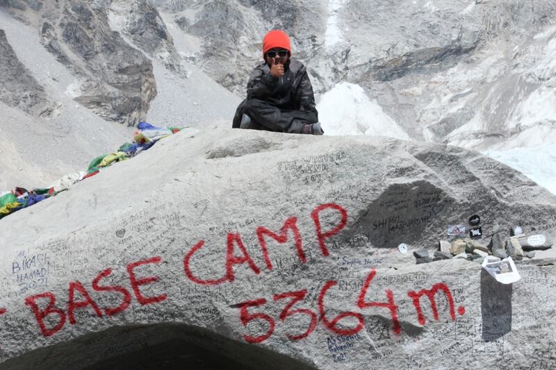 Oscar Pacheco at Everest base camp after his long trek.