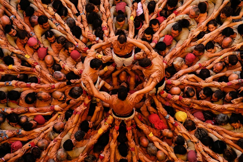 A team form their 'castell', or human tower, during a contest in Tarragona, Spain, in October. EPA