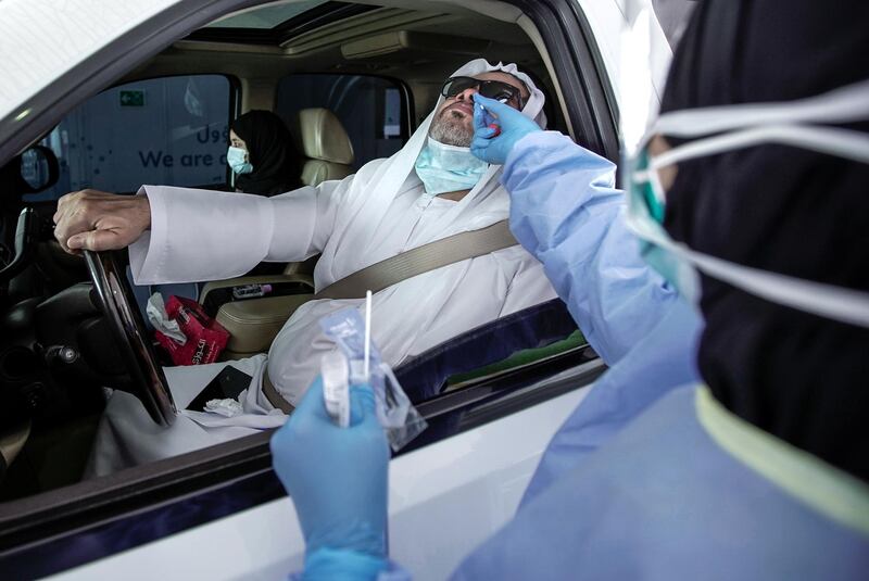 Dubai, United Arab Emirates, April 12, 2020.  A drive-through patient gets tested for the Coronavirus at the National Screening Center, Mina Rashed, Dubai.
Victor Besa / The National
Section:  NA
Reporter:  Nick Webster