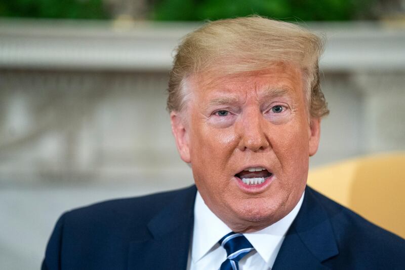 epa07661055 US President Donald J. Trump meets with Canadian Prime Minister Justin Trudeau (not pictured) in the Oval Office of the White House in Washington, DC, USA, 20 June 2019. US President Donald J. Trump spoke to the media about Iran shooting down an American drone, saying that the US reply will be known 'soon'.  EPA/JIM LO SCALZO