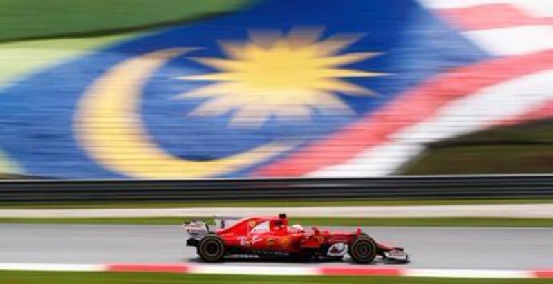 Ferrari driver Sebastian Vettel during practice at the Malaysian Grand Prix. Edgar Su / Reuters