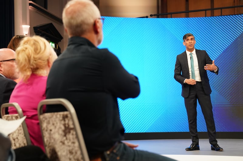 British Prime Minister Rishi Sunak answers questions from the audience in Grimsby. Getty Images