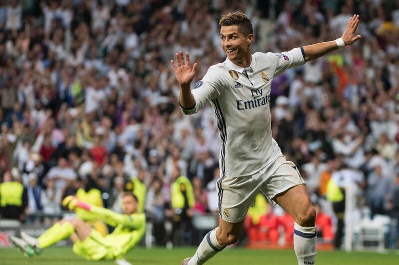 Cristiano Ronaldo's hat-trick in the Uefa Champions League semi-final first leg against Atletico Madrid has put Real Madrid on the brink of a third final in four years. Curto Del La Torre / AFP 

