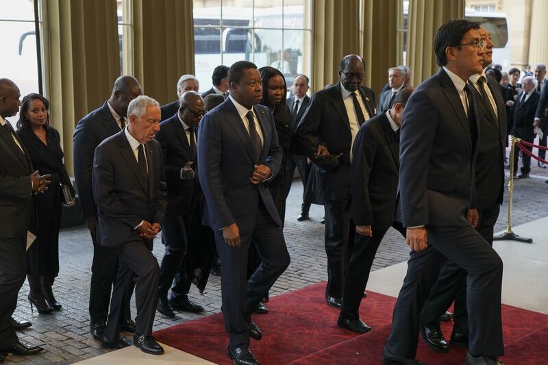 World leaders and heads of state arrive for the reception at Buckingham Palace in London. PA