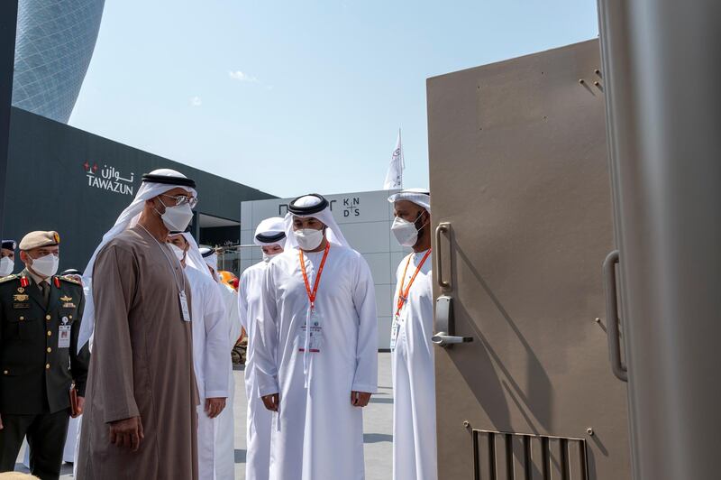 ABU DHABI, UNITED ARAB EMIRATES - February 25, 2021: HH Sheikh Mohamed bin Zayed Al Nahyan, Crown Prince of Abu Dhabi and Deputy Supreme Commander of the UAE Armed Forces (front L), tours the International Defence Exhibition and Conference (IDEX), at ADNEC.

( Mohamed Al Hammadi / Ministry of Presidential Affairs )
---