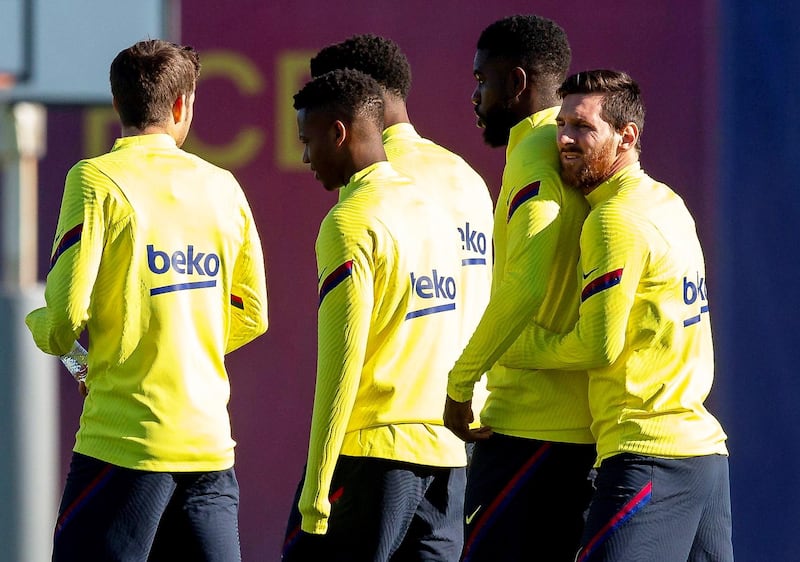 Barcelona's Lionel Messi, right, during training at Sant Joan d'Espi sports city on the eve of their Copa del Rey quarter-final against Athletic Bilbao. EPA