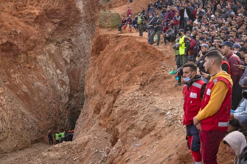 Search crews first used five bulldozers to dig vertically to a depth of more than 31 metres. AFP