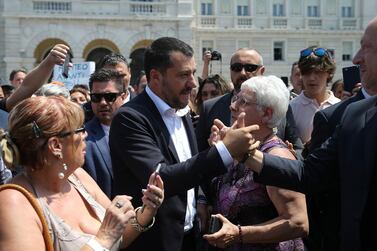 Italy's deputy prime minister Matteo Salvini is greeted by supporters in Trieste, Italy, Friday, July 5, 2019. AP