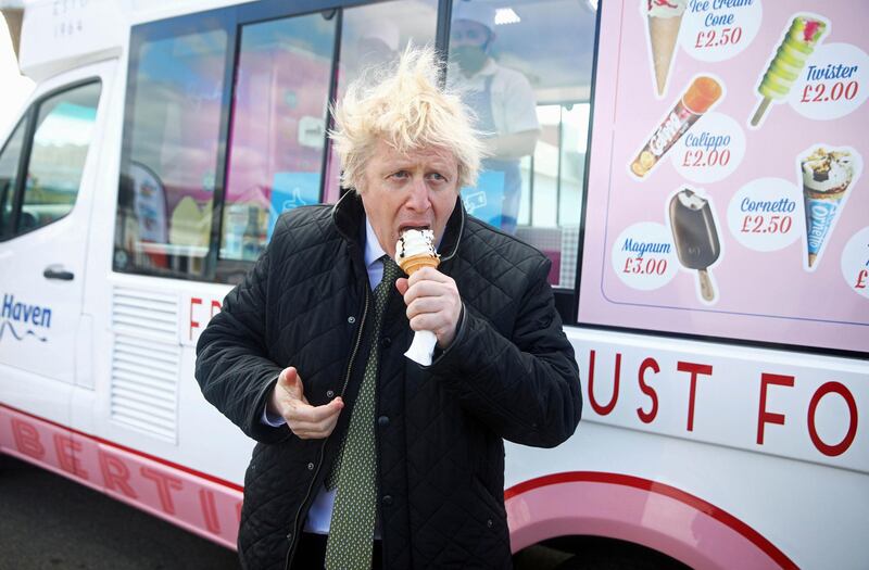 Britain's Prime Minister Boris Johnson during a visit to Haven Perran Sands Holiday Park in Perranporth, Cornwall, Wednesday to see how they are preparing to reopen. Johnson confirmed that businesses from barbers to bookstores will be allowed to reopen next week and that Britain's slow but steady march out of a three-month lockdown is on track. AP