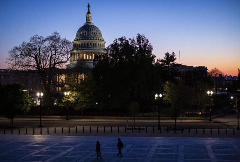 The U.S. Capitol stands at dusk in Washington, D.C., U.S., on Thursday, April 16, 2020. President Donald Trump threatened Wednesday to try to force both houses of Congress to adjourn -- an unprecedented move that would likely raise a constitutional challenge -- so that he can make appointments to government jobs without Senate approval. Photographer: Al Drago/Bloomberg