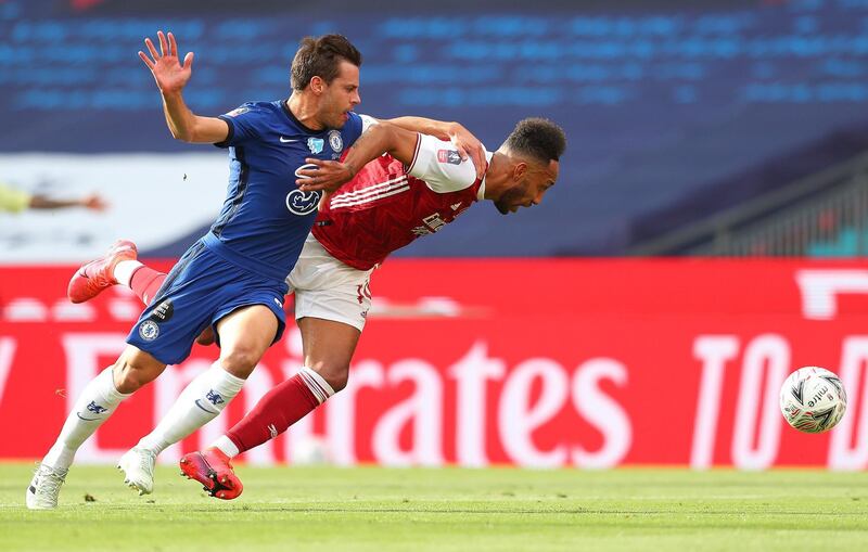 Chelsea's Spanish defender Cesar Azpilicueta (L) fouls Arsenal's Gabonese striker Pierre-Emerick Aubameyang to conceed a penalty during the English FA Cup final football match between Arsenal and Chelsea at Wembley Stadium in London, on August 1, 2020.  - NOT FOR MARKETING OR ADVERTISING USE / RESTRICTED TO EDITORIAL USE 
 / AFP / POOL / Catherine Ivill / NOT FOR MARKETING OR ADVERTISING USE / RESTRICTED TO EDITORIAL USE 

