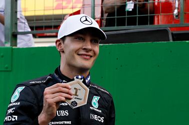 Mercedes driver George Russell, of Britain, celebrates winning the Sprint Race qualifying session at the Interlagos racetrack, in Sao Paulo, Brazil, Saturday, Nov.  12, 2022.  The Brazilian Formula One Grand Prix will take place on Sunday.  (AP Photo / Marcelo Chello)